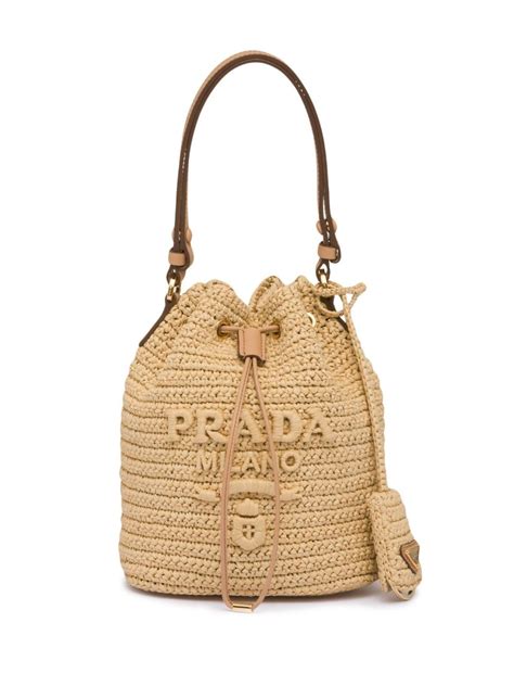 prada raffia bucket bag.